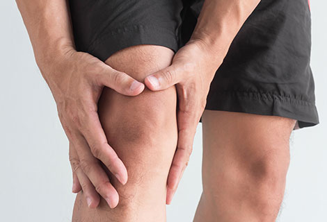 Man suffering with from knee pain